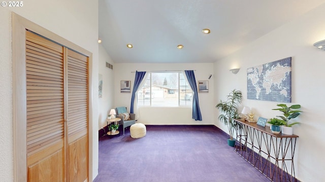 interior space with baseboards, visible vents, lofted ceiling, recessed lighting, and carpet flooring