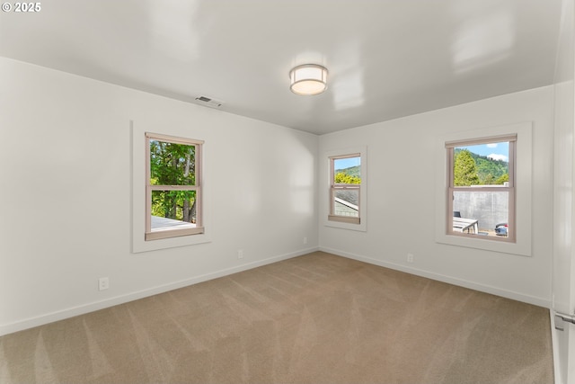512 NE Division St, Myrtle Creek, OR 97457 - carpeted spare room with baseboards