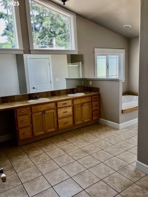 3843 Shannon St, Eugene, OR 97404 - bathroom with double vanity, a bath, tile patterned flooring, and lofted ceiling