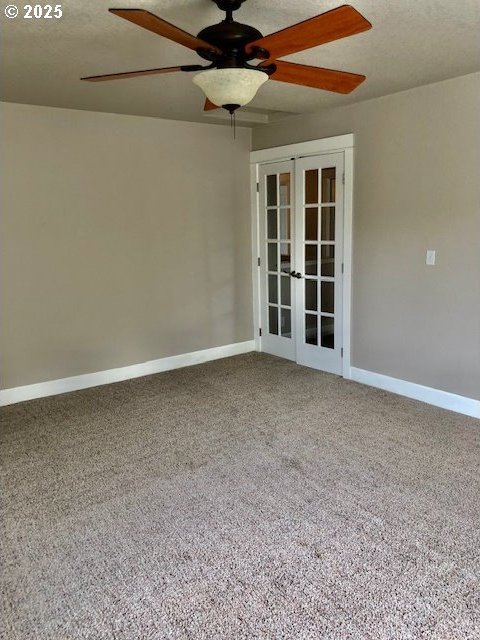 3843 Shannon St, Eugene, OR 97404 - carpeted empty room featuring french doors and a ceiling fan