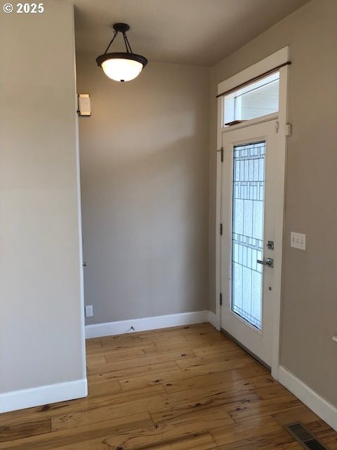 3843 Shannon St, Eugene, OR 97404 - entrance foyer with baseboards and light wood-style flooring