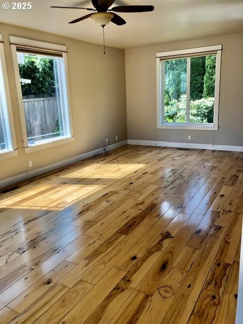 3843 Shannon St, Eugene, OR 97404 - spare room with a ceiling fan and wood-type flooring