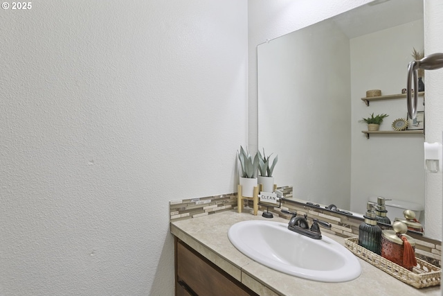 52193 SE Tussing Way, Scappoose, OR 97056 - bathroom with tasteful backsplash and vanity