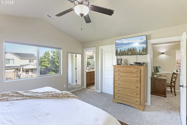 52193 SE Tussing Way, Scappoose, OR 97056 - bedroom with light colored carpet, lofted ceiling, ensuite bathroom, and ceiling fan