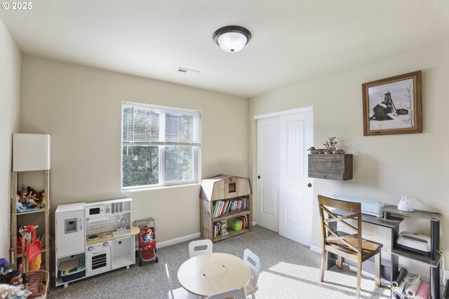 52193 SE Tussing Way, Scappoose, OR 97056 - recreation room with carpet and baseboards