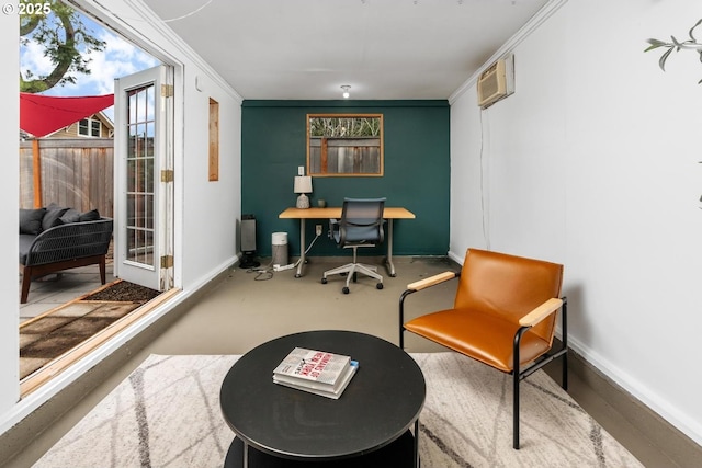 office area featuring baseboards, ornamental molding, and a wall mounted AC