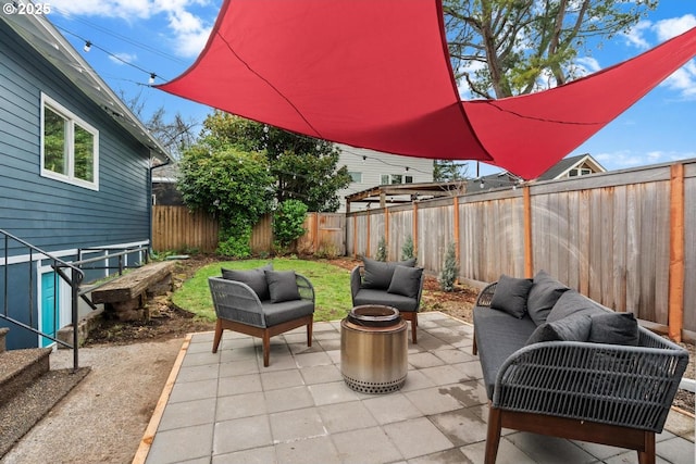 view of patio / terrace with outdoor lounge area and a fenced backyard