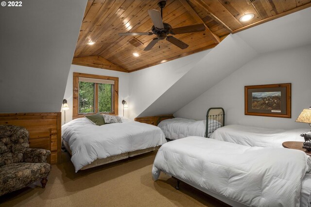 bedroom featuring ceiling fan, carpet flooring, vaulted ceiling, and wooden ceiling