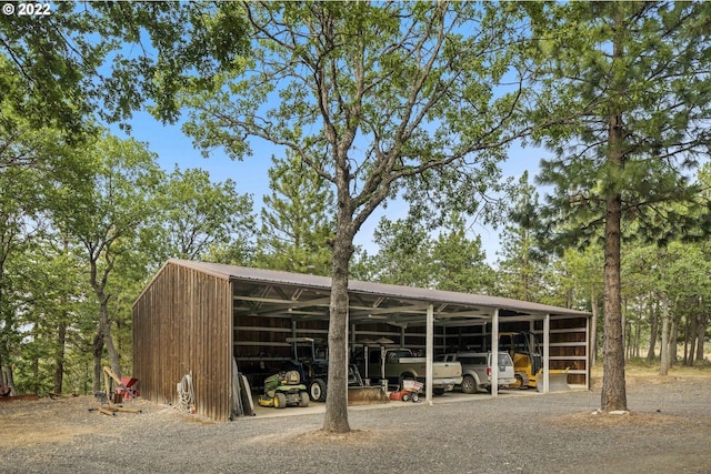 exterior space with a carport