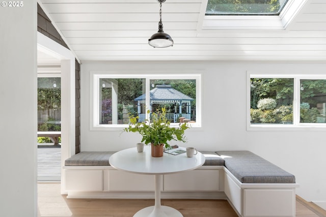 sitting room with healthy amount of natural light and light wood-style floors