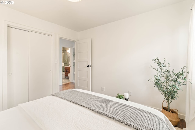 841 NE 77th Ave, Portland, OR 97213 - bedroom with a closet and wood finished floors