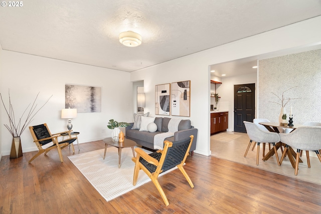 841 NE 77th Ave, Portland, OR 97213 - living area featuring wood finished floors and recessed lighting