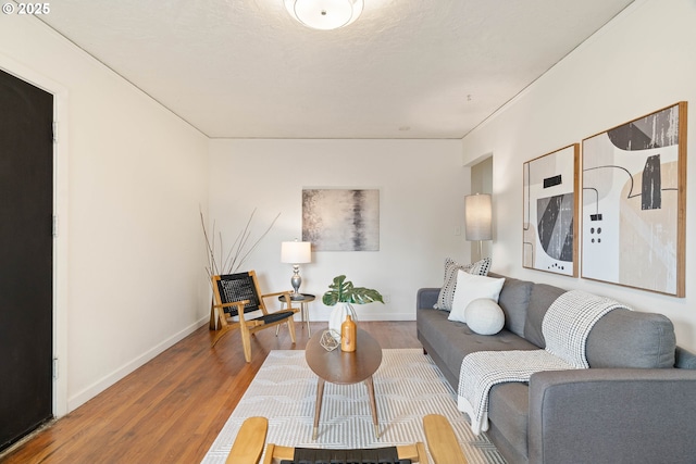 841 NE 77th Ave, Portland, OR 97213 - living room featuring wood finished floors and baseboards