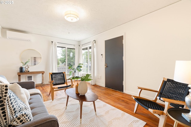 841 NE 77th Ave, Portland, OR 97213 - living room with an AC wall unit and light wood finished floors