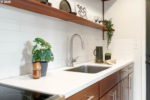 841 NE 77th Ave, Portland, OR 97213 - kitchen with open shelves, backsplash, and light countertops