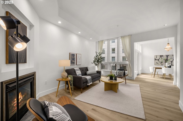 living room featuring light wood-type flooring