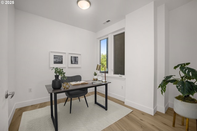 office space featuring light hardwood / wood-style flooring