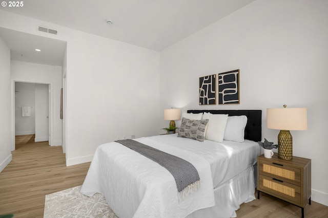 bedroom featuring light hardwood / wood-style floors