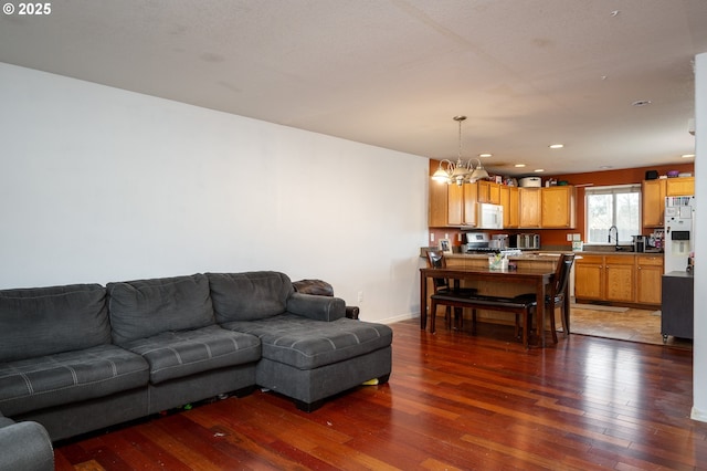 3052 Tierra Dr, Salem, OR 97305 - living area with hardwood / wood-style floors, recessed lighting, baseboards, and a chandelier