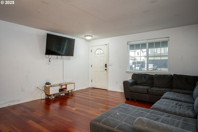 3052 Tierra Dr, Salem, OR 97305 - living room featuring baseboards and wood finished floors