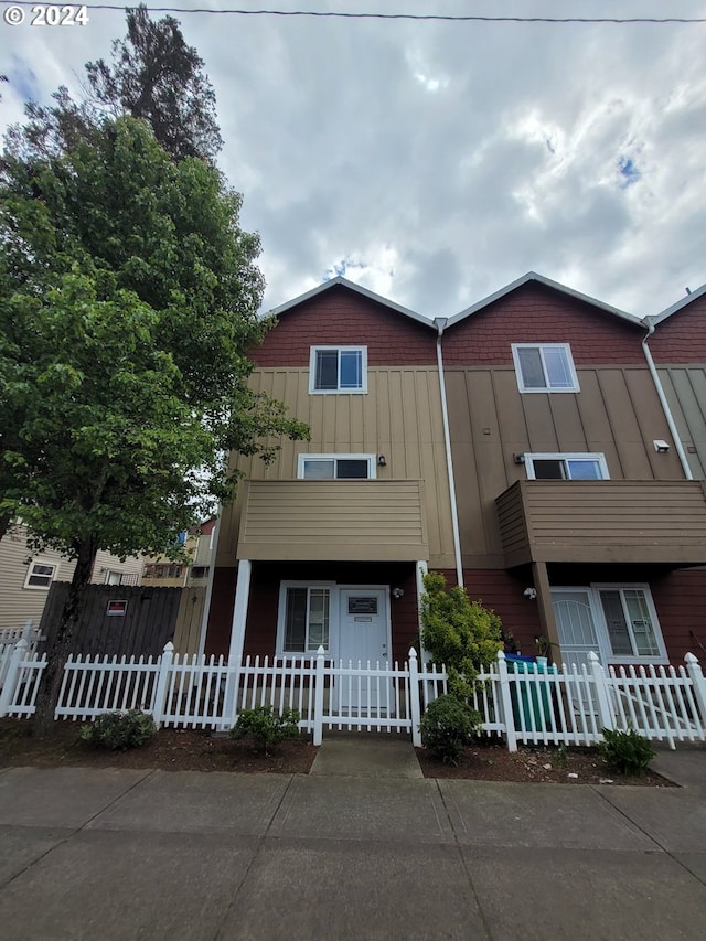 8746 SE Division St, Portland, OR 97266 - view of property featuring board and batten siding