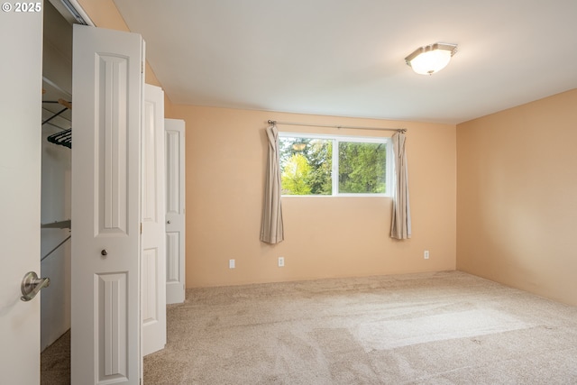 unfurnished bedroom with carpet flooring