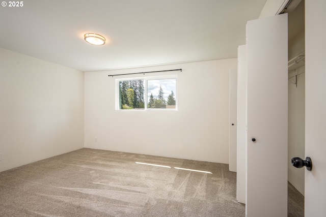 spare room with carpet floors