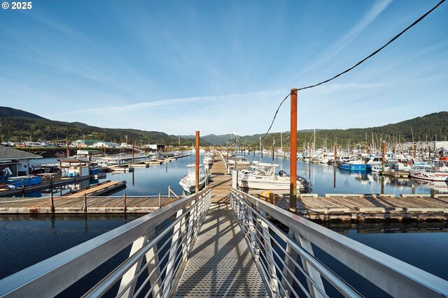 208 Acacia Ave, Garibaldi, OR 97118 - view of dock featuring a water and mountain view