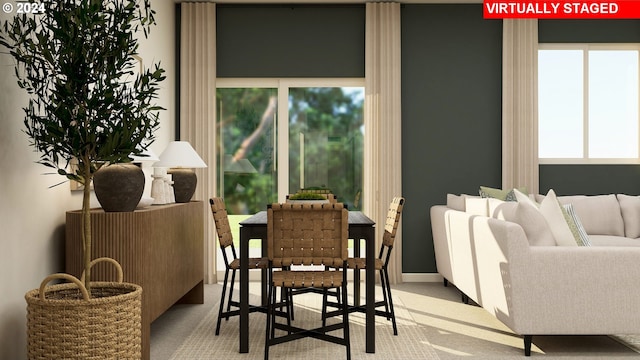 dining room featuring carpet flooring