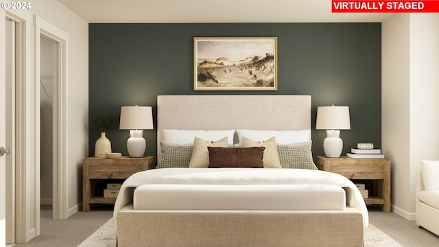 bedroom featuring carpet floors and baseboards
