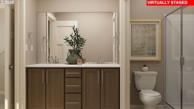 bathroom featuring toilet, a shower stall, and double vanity
