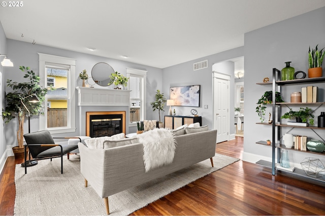 living room with dark hardwood / wood-style floors