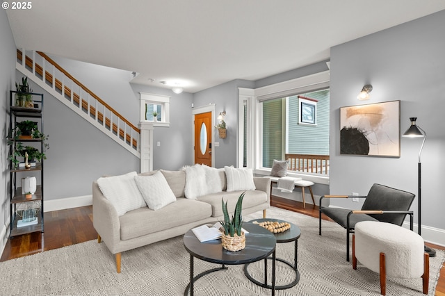 living room featuring dark wood-type flooring