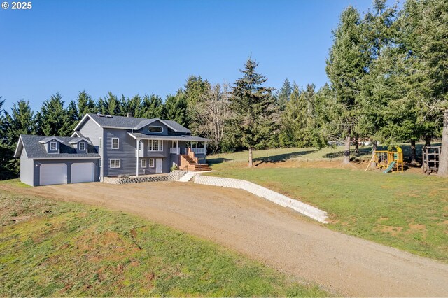 view of outbuilding featuring a garage, a lawn, and solar panels