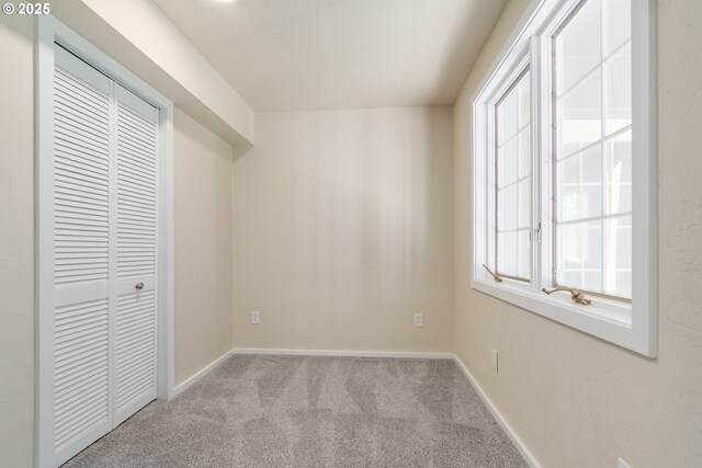 unfurnished living room featuring a fireplace and light hardwood / wood-style flooring