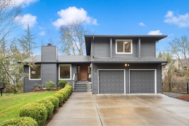 view of front of home with a garage, concrete driveway, a chimney, and fence