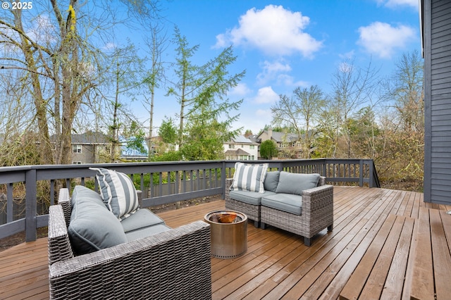 wooden deck with an outdoor hangout area