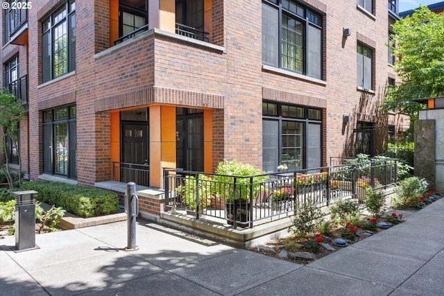 2350 NW Savier St Unit 100, Portland, OR 97210 - property entrance featuring brick siding