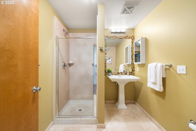2350 NW Savier St Unit 100, Portland, OR 97210 - bathroom with a shower stall and tile patterned floors