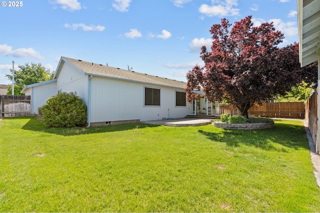 back of property with a patio