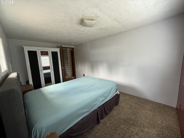 31431 Fairview Rd, Rainier, OR 97048 - bedroom featuring carpet and a textured ceiling