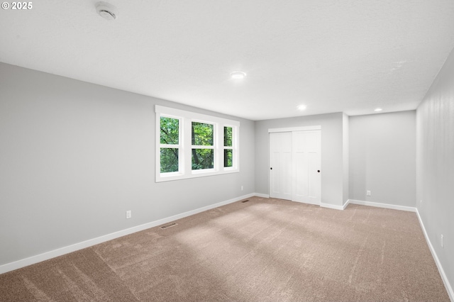 18240 SW Jay St, Beaverton, OR 97003 - unfurnished bedroom with carpet, recessed lighting, and a closet