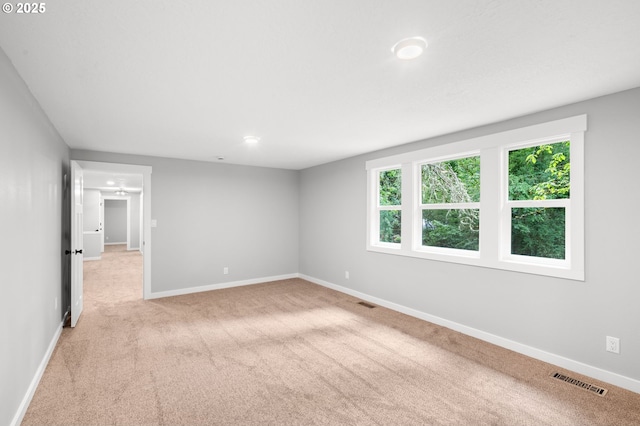 18240 SW Jay St, Beaverton, OR 97003 - empty room with baseboards and light carpet