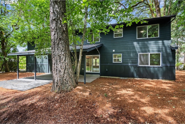 18240 SW Jay St, Beaverton, OR 97003 - back of property with a patio area