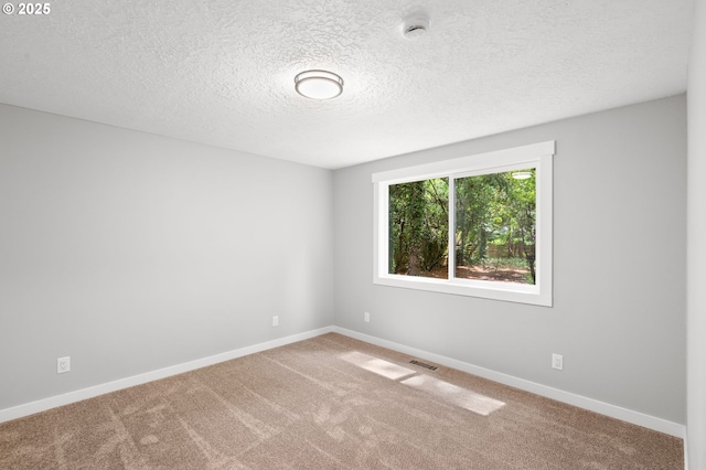 18240 SW Jay St, Beaverton, OR 97003 - unfurnished room with carpet, a smoke detector, and a textured ceiling