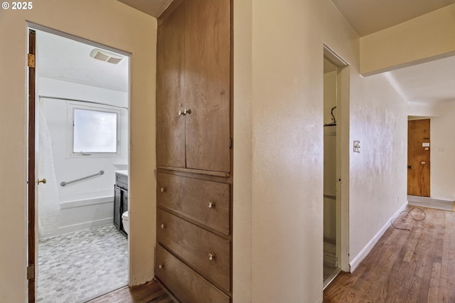 hall featuring hardwood / wood-style flooring