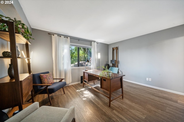 office featuring wood finished floors and baseboards