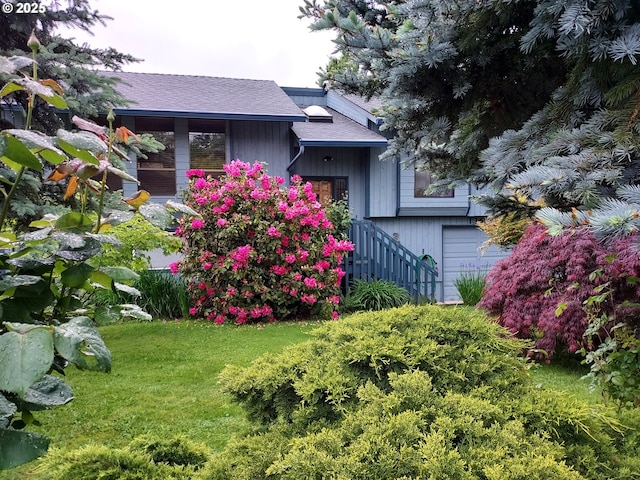 view of yard with an attached garage