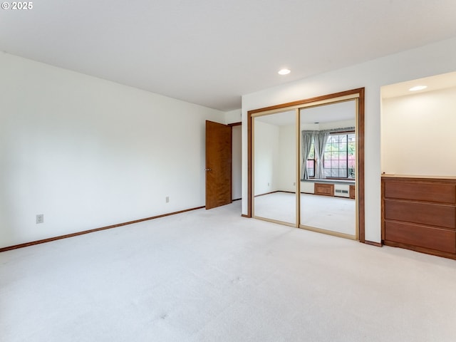 2221 NW 206th St, Ridgefield, WA 98642 - unfurnished bedroom with light colored carpet, a closet, and recessed lighting