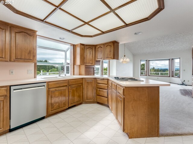 2221 NW 206th St, Ridgefield, WA 98642 - kitchen with stainless steel appliances, light countertops, brown cabinetry, and recessed lighting